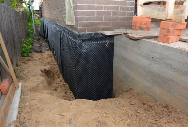 Happy homeowners after waterproofing job in Moreland